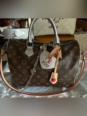 Fashionable Brown Monogram Satchel with Heart Charm and Chain Strap